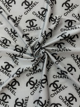 Load image into Gallery viewer, Chanel Design Logo Print on Solid Color Spandex
