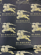 Load image into Gallery viewer, Burberry Gold Logo Design Spandex Fabric
