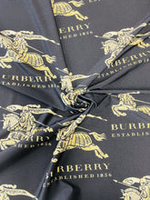 Load image into Gallery viewer, Burberry Gold Logo Design Spandex Fabric
