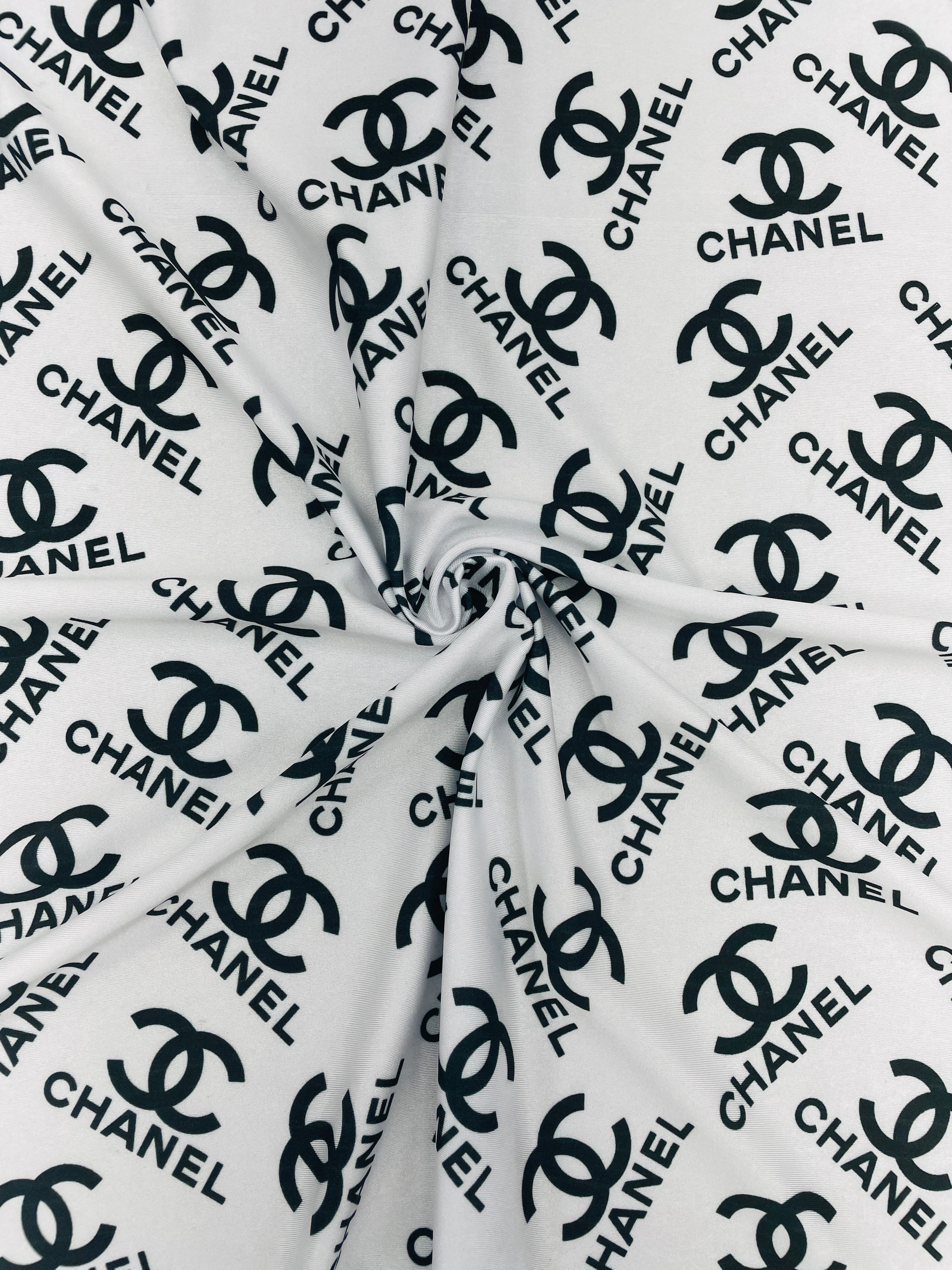 Chanel Design Logo Print on Solid Color Spandex – designerfabricscenter