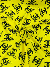 Load image into Gallery viewer, Chanel Design Logo Print on Solid Color Spandex
