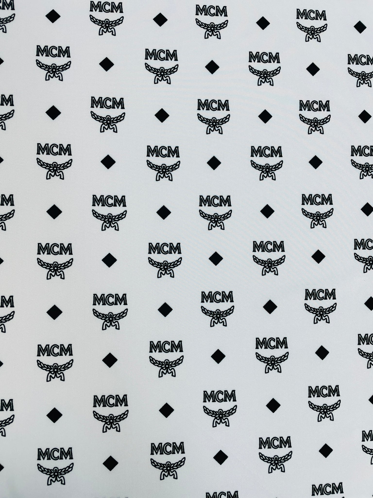 MCM Print Spandex in Black, Tan, and White – designerfabricscenter