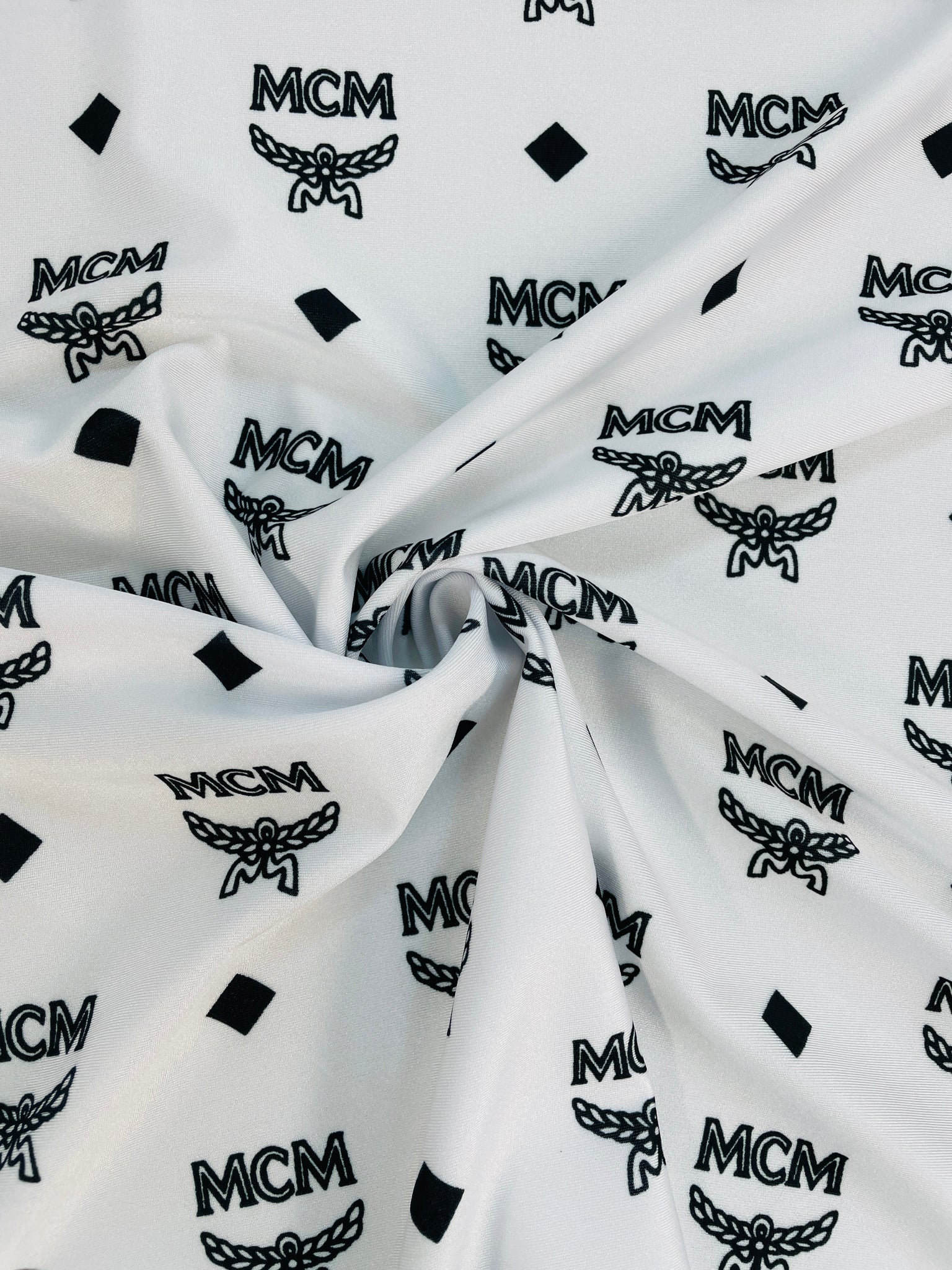 MCM Print Spandex in Black, Tan, and White – designerfabricscenter